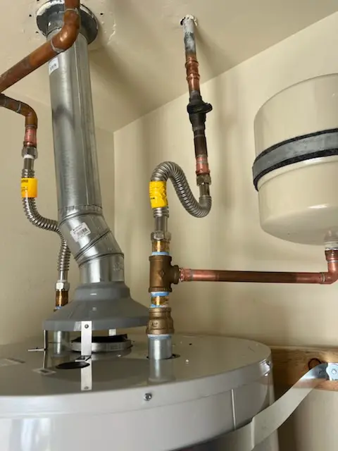 Water heater installation and plumbing repair in Colony Club